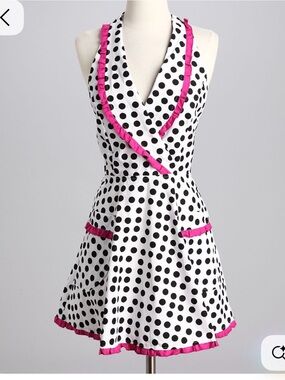 American Hostess brand vintage-style polka dot apron featuring pink.